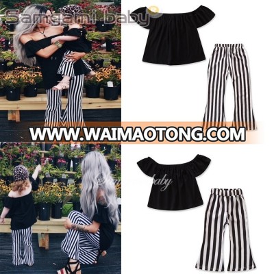 The new 2018 mother-daughter suit off Shoulder shirt + striped flared trousers